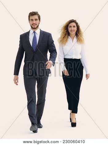 two successful employee confidently go forward