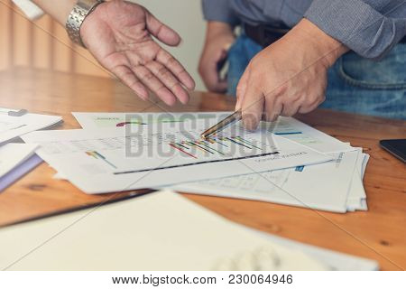 Business And Finance Concept Of Office Working, Businessman Discussing Sale Analysis Chart