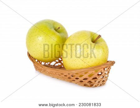 Fresh Japanese Toki Apples In Bamboo Basket On White Background