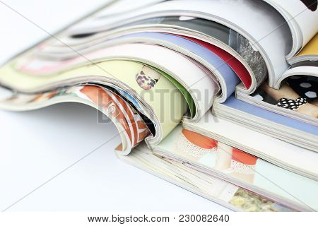 Stack Of Magazines Isolated On White Background