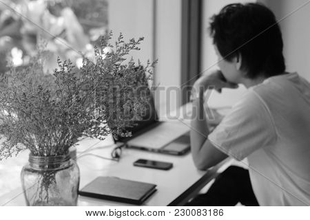 Blurred Background : Workingman In Workspace With Black And White Style