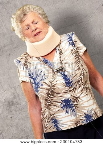 A Senior Woman Wearing A Neckbrace, Indoor