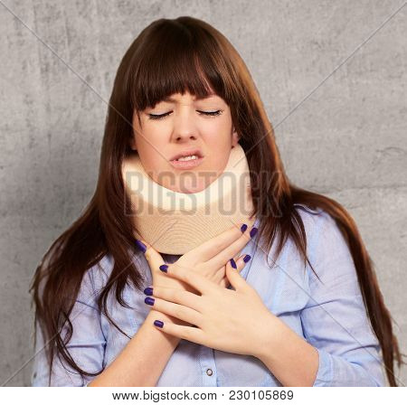 Woman Wearing Neckbrace, Indoor
