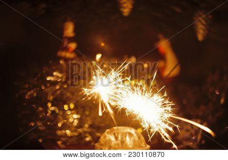 Chinese Candle In Front Of Christmas Tree