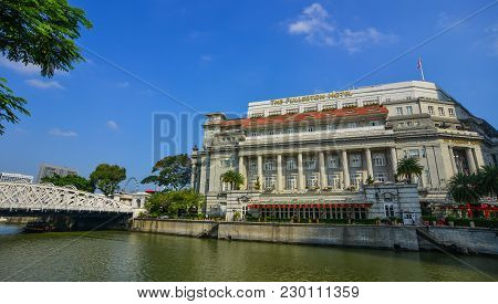 Singapore - Feb 9, 2018. Famous Fullerton Hotel With Riverscene In Singapore. Singapore Is Global Fi