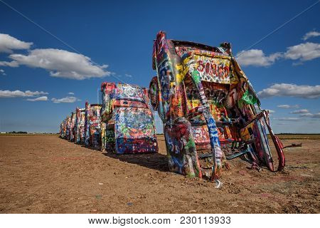 Amarillo, Texas, Usa - May 12, 2016 : Cadillac Ranch In Amarillo. Cadillac Ranch Is A Public  Art In