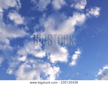 Blue Sky And White Clouds. Background Heaven.