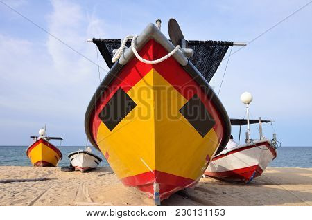 Closed Up View And Cropped Image Of Tradisional Fisherman Boat Park On The Sandy Beach