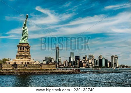 Statue Of Liberty Monument In Front Of New York Skyline New Colorgrading