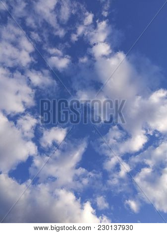 Blue Sky And White Clouds. Background Heaven.