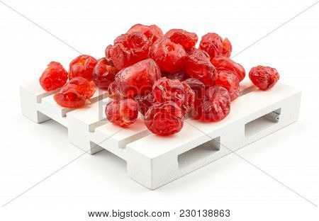 Red Dry Cherries On A Pallet Isolated On White Background
