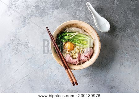 Asian Dish Udon Noodles With Egg Yolk, Sesame, Mushrooms, Boc Choy, Sliced Sous Vide Cooked Meat Ser