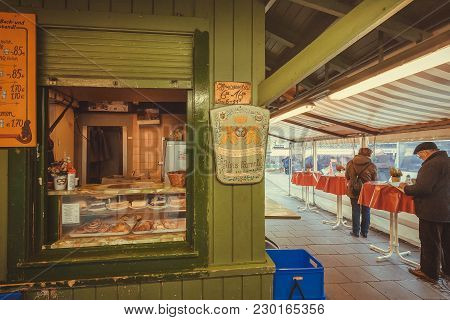 Munich, Germany - November 16, 2017: People Eating Street-food Inside Cafe Of Famous Market Viktuali