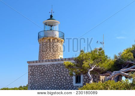 Lighthouse Of Keri Located At The Marathias Cape On Zakynthos Island In Greece. The Height Of The To