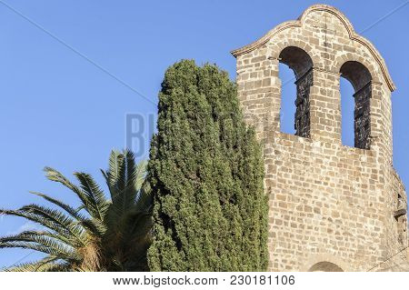 Tower Of Church Romanesque Monastery Sant Pau Del Camp, Located In Raval Quarter. Barcelona.
