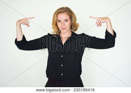 Positive Successful Young Woman Pointing At Herself And Looking At Camera. Content Startupper Confid