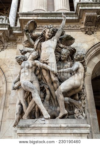 Architectural details of Opera National de Paris: Dance Facade sculpture by Carpeaux. Grand Opera (Garnier Palace) is famous neo-baroque building in Paris, France - UNESCO World Heritage Site.