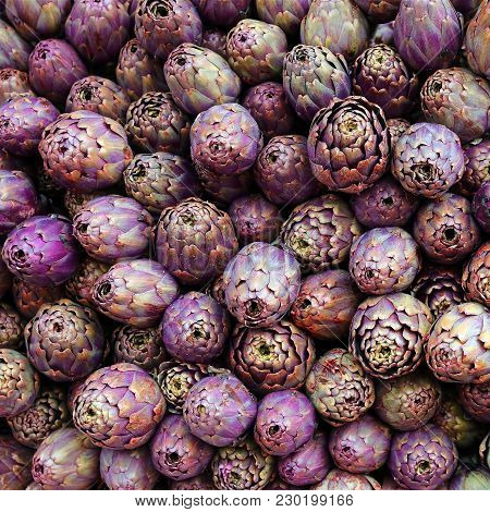 Background Of Ripe Artichokes For Sale In Southern Italy Market