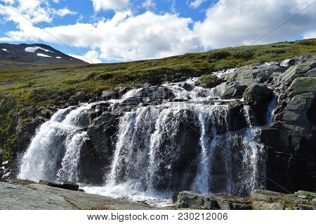 Waterfall Somewhere In National Park In Norway