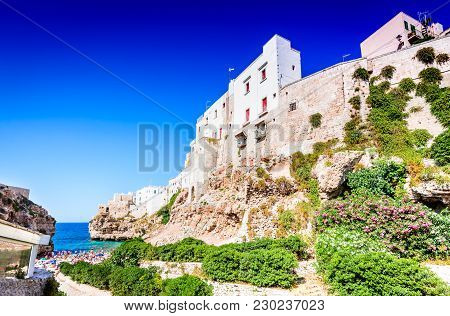 Polignano A Mare, Puglia, Italy. Sunset At Cala Paura Gulf, Province Of Bari, Apulia, Southern Itali
