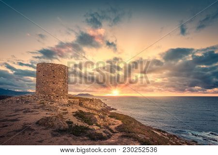 Dramatic Sunset At Punta Spanu On The Coast Of Corsica