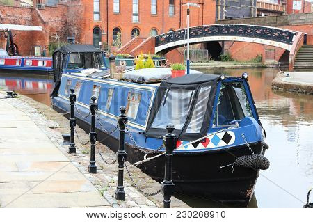 Manchester, Uk. Historic Castlefield District, Waterway Canal Area With Narrowboats.