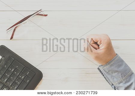 Business Man Hand With Office Supplies On Table