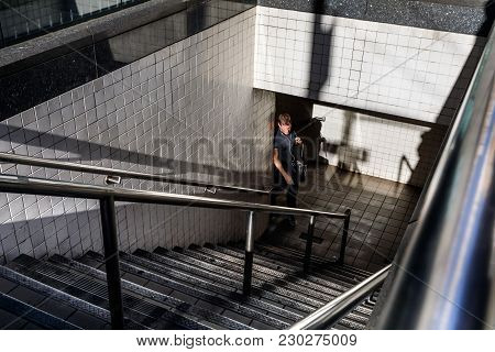New York, Usa - Sep 23, 2017: Manhattan Street Scene. Light And Shadows In New York City. Man Comes 