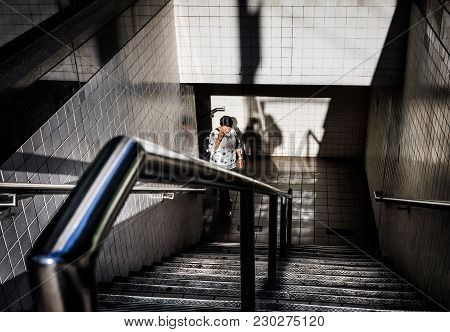 New York, Usa - Sep 23, 2017: Manhattan Street Scene. Light And Shadows In New York City. Woman Come