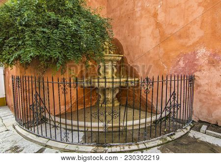 Old Fountain In Seville Santa Cruz Quarter Spain.