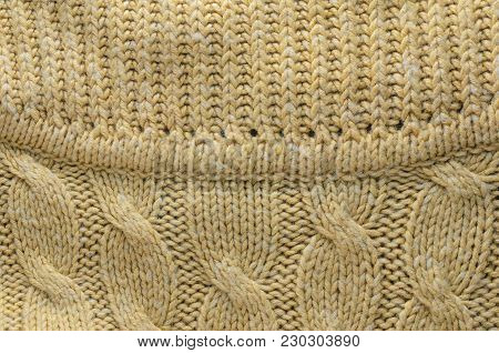 Knit texture of wool knitted fabric with regular pattern as background