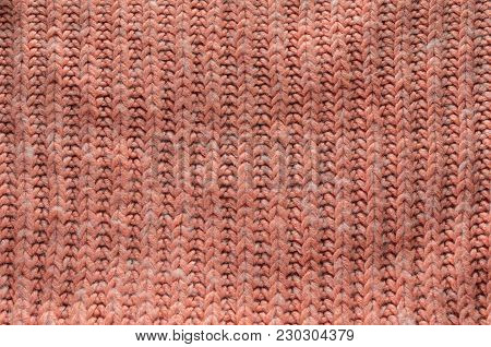Red Knit Texture of Wool Knitted Fabric with Regular Pattern. Blank Knit Background