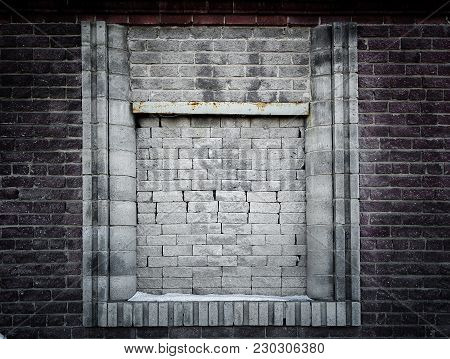 Immured window in old brick house. Old architecture. Grunge window. Immured window. Grunge style. Grunge house. Window.