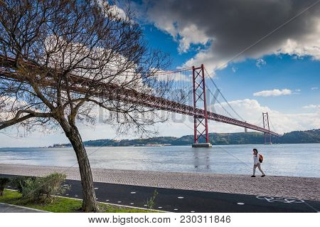 Lisbon, Portugal - January 28, 2011: Walks Along The Banks Of Tagus River In Belem