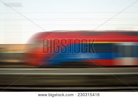 Blurred Motion Of Express Train Vehicle On Railway, High Speed Concept.