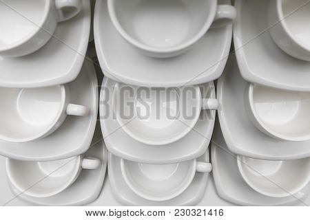 Many Rows Clean White Coffee Cup, Tea Spoon And Saucer On Table. Empty Mug Set In Row Prepare For Co