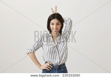 Girl Laughs Over Friend Who Was Cheated On. Portrait Of Playful Attractive European Female Girlfrien