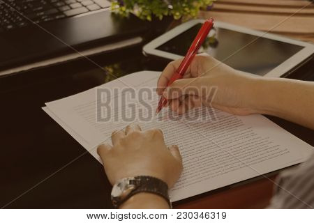 Proofreading Sheet On Working Table In Office