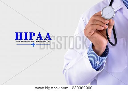 Doctor Holding A Stethoscope And Word 
