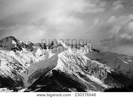 Snowy Winter Mountain And Cloudy Sky In Evening. Caucasus Mountains. Svaneti Region Of Georgia. Blac