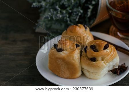 Homemade Soft And Sticky Raisin Bread Or Cinnamon Rolls Glaze With Icing. Cinnamon Rolls Look So Del