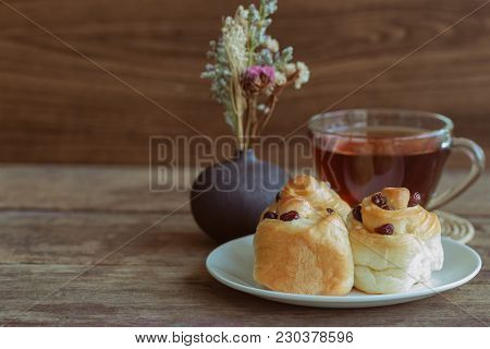 Homemade Soft And Sticky Raisin Bread Or Cinnamon Rolls Glaze With Icing. Cinnamon Rolls Look So Del