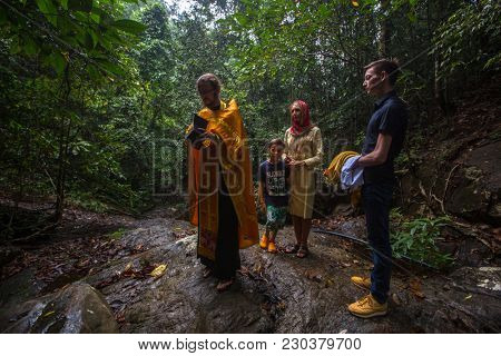 KOH CHANG, THAILAND - MAR 9, 2018: During Christian sacrament of spiritual birth - Baptism. There are currently 10 Orthodox parishes in Thailand, Orthodoxy is practiced by 0.002% of population.