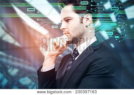 Side Portrait Of Handsome Thoughtful Caucasian Businessman On Blurry Background With Circuit Board. 