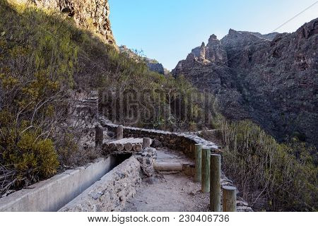 Irrigational Canal In Picturesque Rural Area With Open Watergate