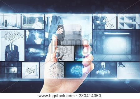 Creative Digital Photo Gallery Backdrop. Businessman Hand Holding Smartphone With Hologram. Double E