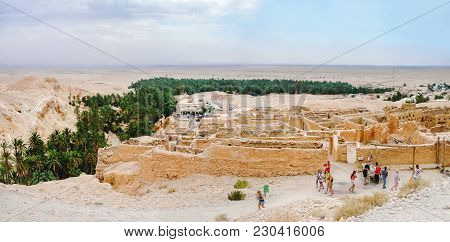 Chebika, Tunisia - September 04, 2007. Tourists In Oasis Chebika, Famous Landmark In Sahara Desert. 