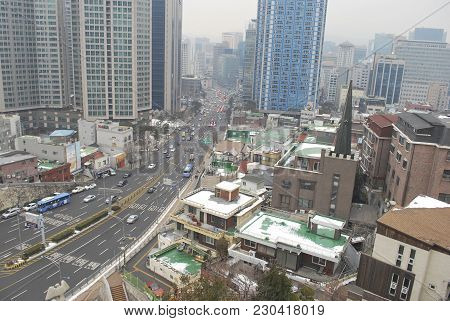 Seoul, South Korea - January 26th 2017: Seoul City From Top Hill View Surrounded By Skycrappers