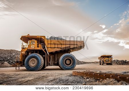 Rustenburg, South Africa, 10/15/2012, Dump Trucks Transporting Platinum Ore For Processing