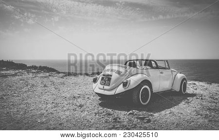 SAGRES, PORTUGAL - AUGUST 26, 2016: Classic cabrio car at Cape St. Vincent in Portugal